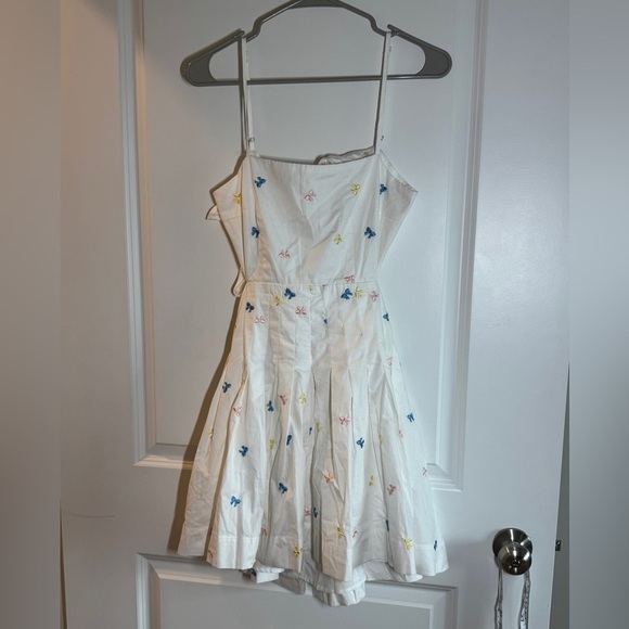 Chic White Backless Dress with Spaghetti Straps - Picture 8 of 13